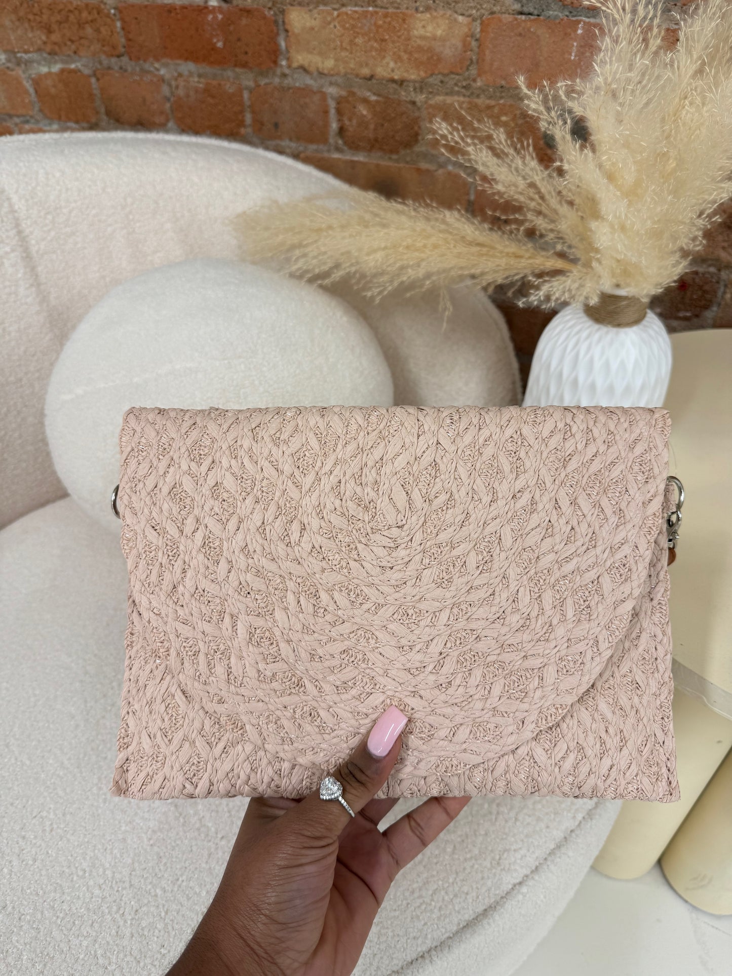 Straw clutch bag