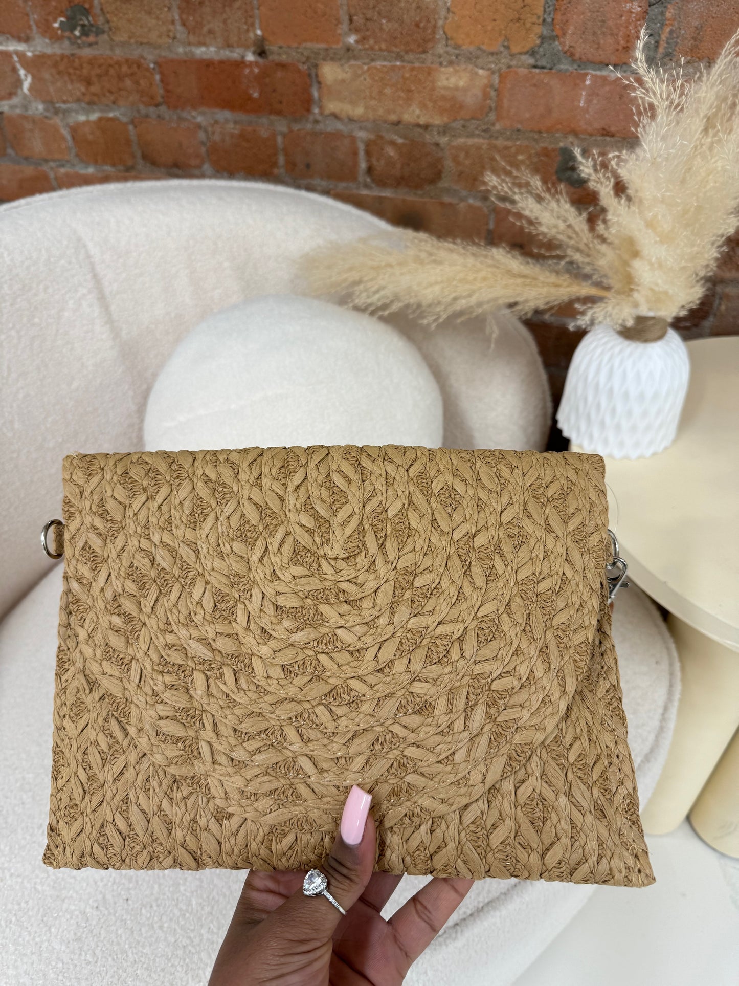 Straw clutch bag